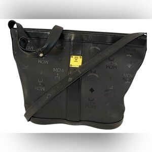 MCM black coated canvas crossbody bag with leather trim-Inside has dry peeling